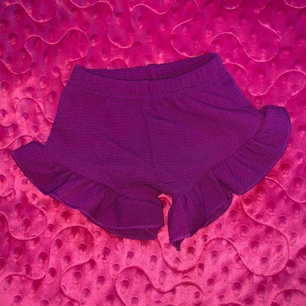 Fuchsia ruffle shorts!